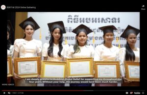 Four graduates smile proudly in their caps and gowns at a ceremony.